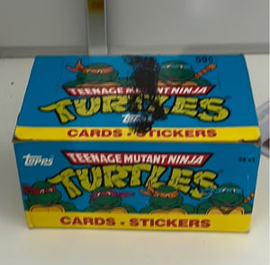Topps Teenage Mutant Ninga Turtles Pack-11 cards, 1 sticker per pack